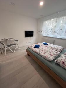 Katil atau katil-katil dalam bilik di ALS Apartments Poprad