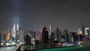 Nespecifikovaný výhled na destinaci Kuala Lumpur nebo výhled na město při pohledu z hostelu