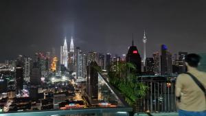 Nespecifikovaný výhled na destinaci Kuala Lumpur nebo výhled na město při pohledu z hostelu