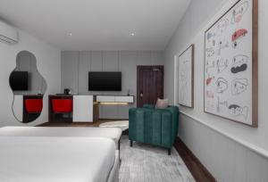 Μια τηλεόραση ή/και κέντρο ψυχαγωγίας στο Ivy Lush Hotel
