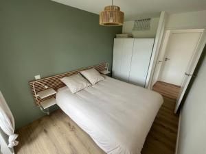 Postel nebo postele na pokoji v ubytování Bel appartement T2 "Mondarrain" avec terrasse