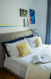 Postel nebo postele na pokoji v ubytování Milvio22 Apartment