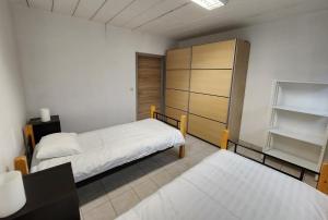 Ένα ή περισσότερα κρεβάτια σε δωμάτιο στο Mathilda - apartments