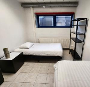 Ένα ή περισσότερα κρεβάτια σε δωμάτιο στο Mathilda - apartments