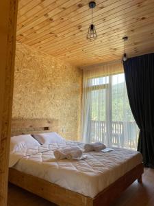 Postel nebo postele na pokoji v ubytování Eco Garden Svaneti