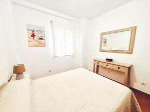 Posteľ alebo postele v izbe v ubytovaní Marina Canela Home