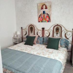 A bed or beds in a room at Apartamento Santa Cruz