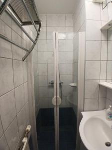 Kúpeľňa v ubytovaní Bajnok Apartman