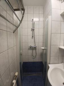 Kúpeľňa v ubytovaní Bajnok Apartman