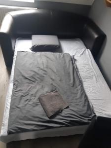 Posteľ alebo postele v izbe v ubytovaní Bajnok Apartman