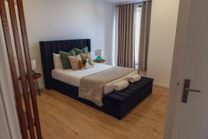 Postel nebo postele na pokoji v ubytování A Casa Da Mãe