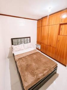 Postel nebo postele na pokoji v ubytování Dream Haven Homestay Deca Clark + 12 fotografií