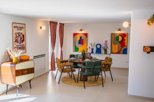 a dining room with a table and chairs at Bitter 26 Apartment - Vinto House Collections in Nocera Superiore