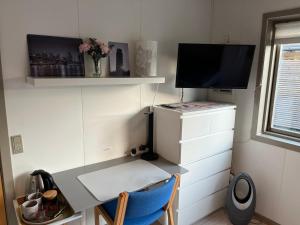A kitchen or kitchenette at Pavillon Greve