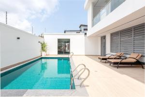 a swimming pool on the roof of a house at Four Two, Rock Drive in Lekki Phase 1