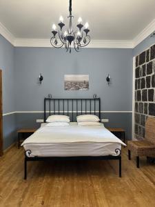 Postel nebo postele na pokoji v ubytování Nur Guest House