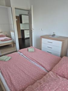 Posteľ alebo postele v izbe v ubytovaní Apartament Vanessa w centrum 600 m od morza