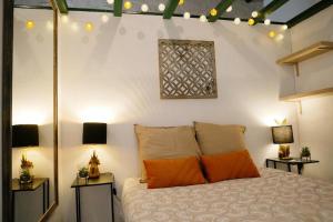 Postel nebo postele na pokoji v ubytování Studio cosy hypercentre Terrasse