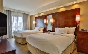 Postel nebo postele na pokoji v ubytování Residence Inn Prescott