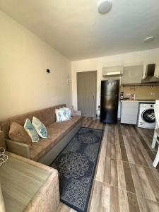 Kuchyň nebo kuchyňský kout v ubytování Camelgila Appartment Royal Residence