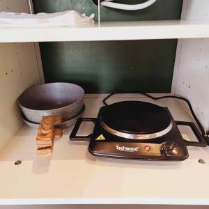 Dapur atau dapur kecil di Fare Toahana, logement chez l'habitant