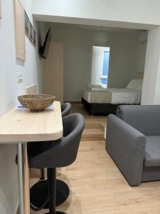 Posezení v ubytování Hermes Central Suite + 37 fotografií
