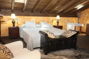 Posada Villa Maria tesisinde bir odada yatak veya yataklar