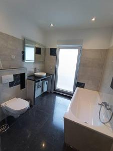 Μια τηλεόραση ή/και κέντρο ψυχαγωγίας στο Big comfort Bungalow incl Carcharger