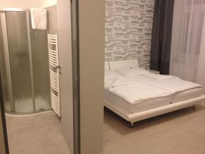 Posteľ alebo postele v izbe v ubytovaní Pension Phoenix