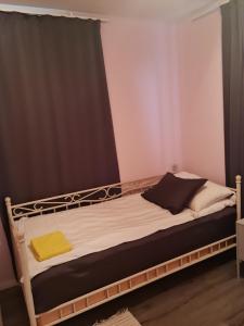 Postel nebo postele na pokoji v ubytování Hietaman Vierastalo Jokipääty