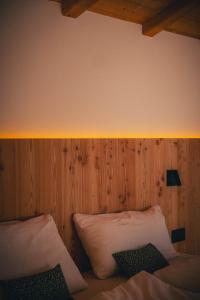 Ein Bett oder Betten in einem Zimmer der Unterkunft Chalet Astra, Whirlpool & Sauna