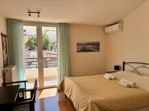 Кровать или кровати в номере Aurora Family Loft