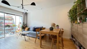 Гостиная зона в Appt 2 Chambres Vue Tour Eiffel