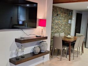 Telewizja i/lub zestaw kina domowego w obiekcie Apartamento AGRELO