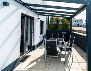 Balkón nebo terasa v ubytování Alp Deluxe - Sauna, Kamin, Terrasse & Mehr