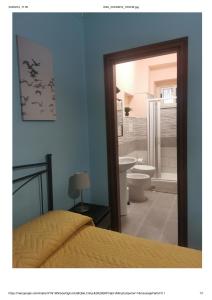 Postel nebo postele na pokoji v ubytování B&B Zì Camillo