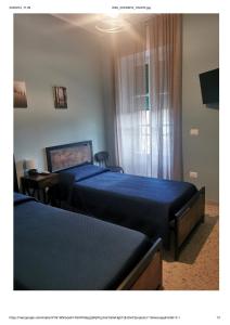Postel nebo postele na pokoji v ubytování B&B Zì Camillo