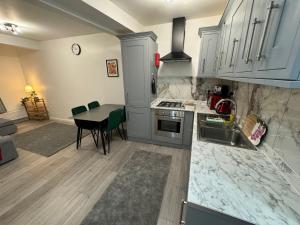 Kuchyň nebo kuchyňský kout v ubytování Seven Sisters Hideaway