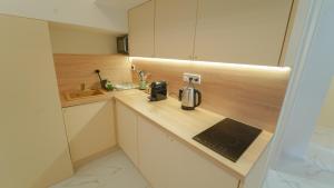 Η κουζίνα ή μικρή κουζίνα στο Panda Home +17 φωτογραφίες