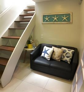 Coin salon dans l'établissement Studio lindo nas Rua das Pedras