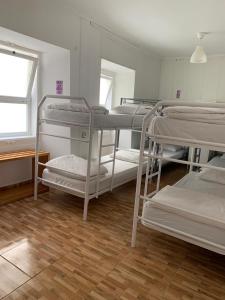 a room with a bunch of bunk beds at Place Polonia in Lisbon