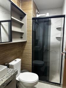 Et badeværelse på Condomínio Jardim dos Coqueiros + 23 billeder