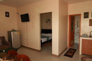 Kuchyň nebo kuchyňský kout v ubytování Jo-Cris Apartelle