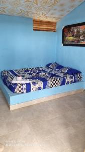 Postel nebo postele na pokoji v ubytování Hostal Laberintos Del Cuzco