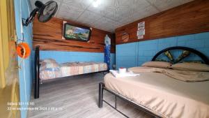 Postel nebo postele na pokoji v ubytování Hostal Laberintos Del Cuzco