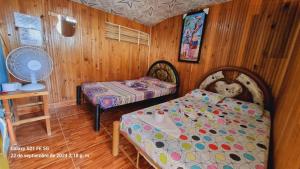 Postel nebo postele na pokoji v ubytování Hostal Laberintos Del Cuzco + 22 fotografií