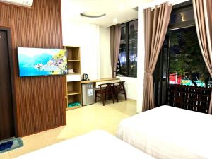 TV a/nebo společenská místnost v ubytování Thanh Hiền HB Hotel