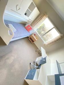 an overhead view of a room with boxes and a window at Russell's Secluded Secret in Russell +40 photos