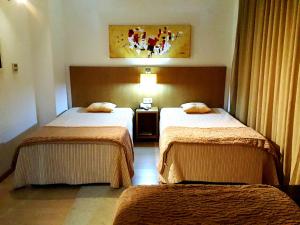 Cama ou camas em um quarto em Hotel Jose Alberto