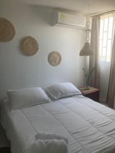 Postel nebo postele na pokoji v ubytování Habitación en apartamento compartido al frente del cc Unico + 17 fotografií